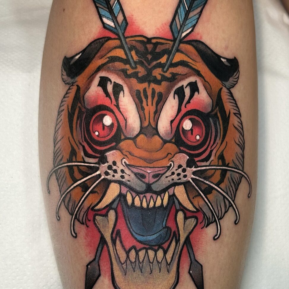 Tatuaje tigre en InkFamia